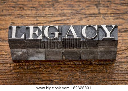 legacy  word in mixed vintage metal type printing blocks over grunge wood