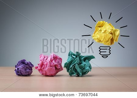 Inspiration concept crumpled paper light bulb metaphor for good idea