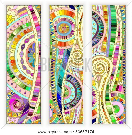 Set of  doodle ethnic cards on wood background.