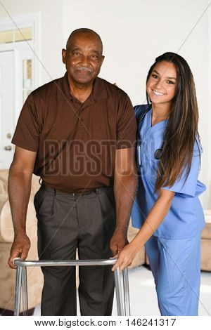 Health care worker helping an elderly patient