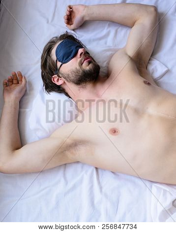 How Eye Mask Help Sleep Better. Man Sleepy Unshaven Bearded Face Sleep In Eye Mask. Guy Sexy Macho L