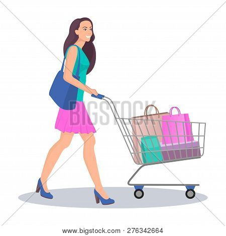 Beautiful Young Woman With Shopping Cart Full Of Packages With Purchases. Happy Smiling Woman Do Sho