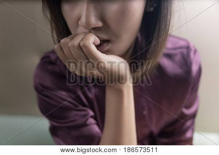 Female drug addiction in room Serious sad woman thinking over a problem Depression and anxiety disorder concept