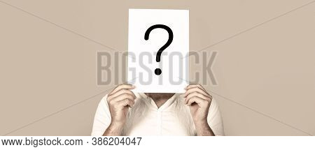 Man A Question. Doubtful Man Holding Question Mark. Question Mark, Symbol. Pensive Male. Getting Ans