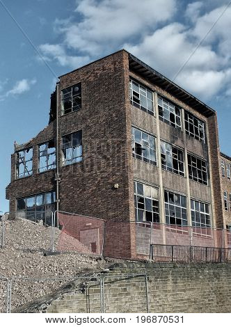 abandoned derelict commerical office building in leeds during demolition