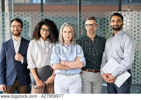 Happy Diverse Business People Team Standing Together In Office, Group Portrait. Smiling Multiethnic 