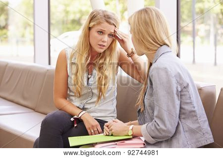 Depressed College Student Talking To Counselor