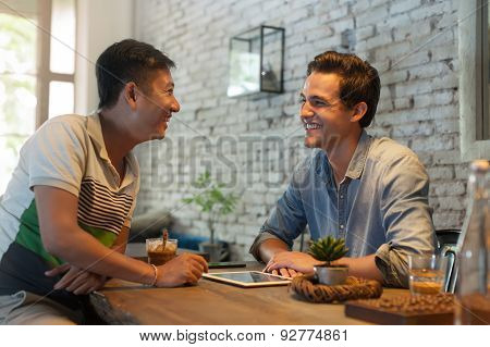 Two Men Sitting at Cafe, Asian Mix Race Friends Guys