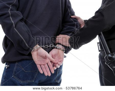 Handcuffed man being escorted by the policeman