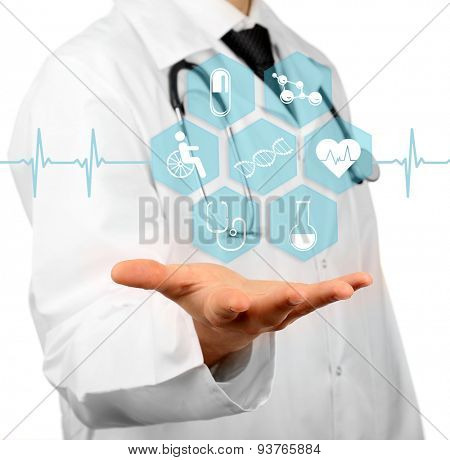 Medical doctor working with healthcare icons. Modern medical technologies concept