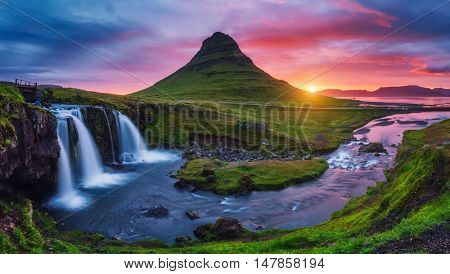 Majestic evening with Kirkjufell volcano the coast of Snaefellsnes peninsula. Dramatic and picturesque scene. Location famous place Kirkjufellsfoss waterfall, Iceland, Europe. Beauty world.