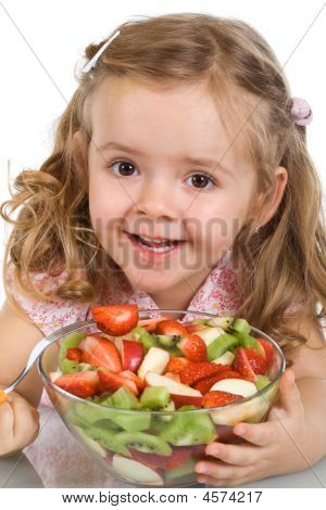 Happy Little Girl With A Bowl Of Fruit Salad