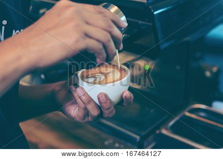 Barista Using Coffee Machine Preparing Fresh Coffee Or Latte Art