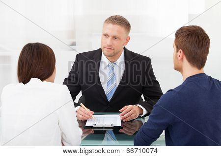 Couple Consulting Financial Advisor