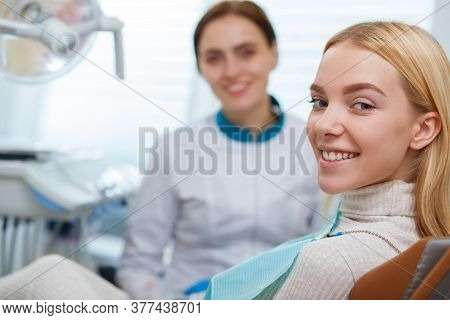 Female Dentist Working At Her Dental Clinic