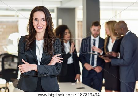 Businesswoman Leader In Modern Office With Businesspeople Working At Background