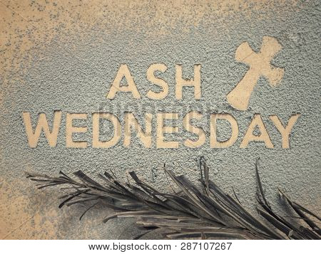 Ash Wednesday Concept - Ash Wednesday Words And A Cross Formed Out Of Ashes. There Are Dry Palm Leaf