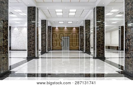 Marble Interior Of A Luxury Lobby Of Company Or Hotel. Clean Corporate Hallway With Real Floor Tile.