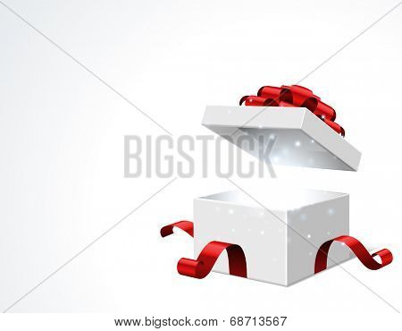 Gift box open and with red bow and ribbon vector illustration. Fireworks sparkles and confetti. 