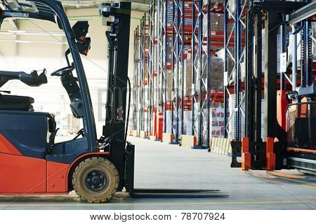 forklift loader pallet stacker truck equipment at warehouse