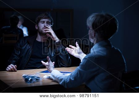 Suspected Man Smoking A Cigarette