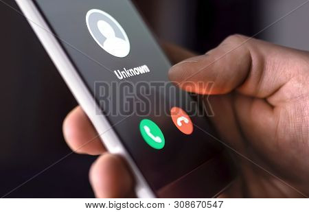 Phone Call From Unknown Number Late At Night. Scam, Fraud Or Phishing With Smartphone Concept. Prank