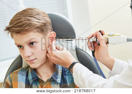 Ear, nose, throat examining. ENT doctor with a child patient and endoscope