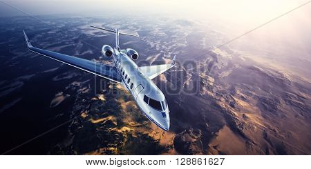 Realistic photo of silver generic design private Jet flying over the mountains. Empty blue sky with sun at background.Business Travel by modern Luxury Plane.Horizontal.Closeup photo. 3D rendering