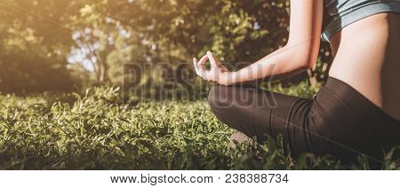 Yoga In The Park, Outdoor With Effect Light, Health Woman, Yoga Woman.  Vintage Tone. Yoga Lifestyle