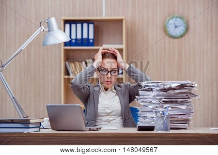 Busy stressful woman secretary under stress in the office