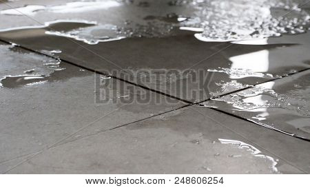 Wet Floor Close Up. It Can Cause Slippery By Water.