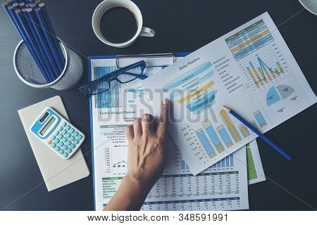 Excel Spreadsheet Stats Graph Analytics Data. Accountant Hands Holding Financial Document Trading In