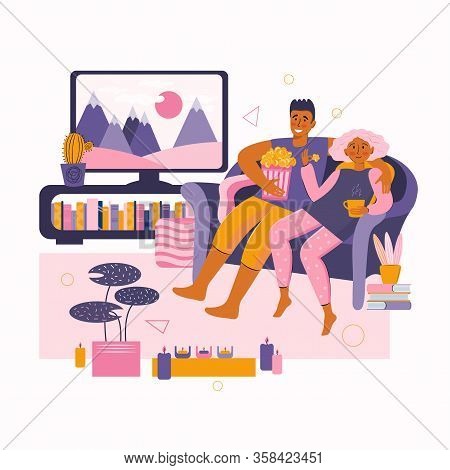 Man And A Woman Spend Time Together At Home. Young Couple Watches Movie On Tv. Home Online Movie The