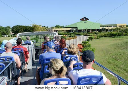 Cayo Coco Cuba 16 january 2016 - people on a touristic bus in the park of hotel Tryp Coco on Cayo Coco Cuba