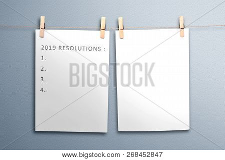 List For 2019 Resolutions In Paper Hanging On Rope. Resolutions Of 2019. Happy New Year 2019