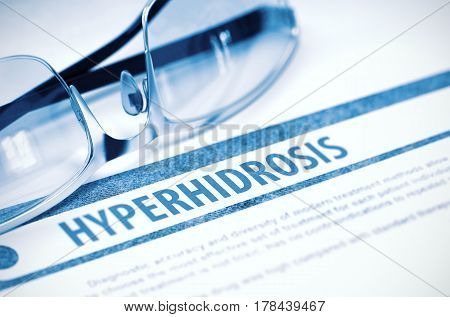 Diagnosis - Hyperhidrosis. Medical Concept with Blurred Text and Glasses on Blue Background. Selective Focus. 3D Rendering.