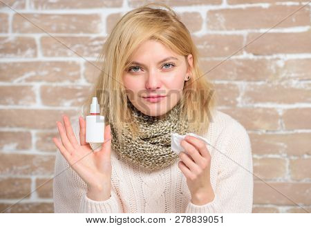 Girl Sick Person Hold Nasal Drops And Tissue. Allergy Concept. Home Treatment. Nasal Drops Plastic B