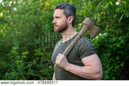 Caucasian Man With Axe. Man With Axe Wearing Shirt. Man With Axe Outdoor. Photo Of Man With Axe