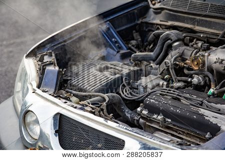 Car Engine Over Heat With No Water In Radiator And Cooling System.
Overheated Car Machine Broken Dow