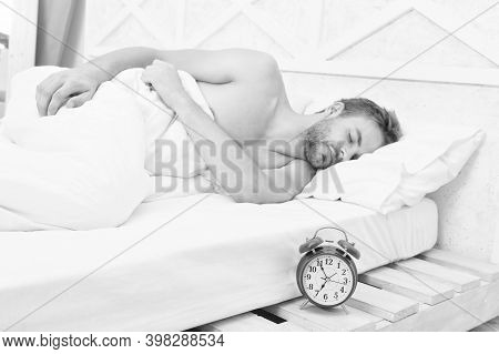 Sleeping Clock Round. Sleeping Man In Bed. Sexy Guy Sleep In Sleeping Room. Bed And Bedding. Bedroom