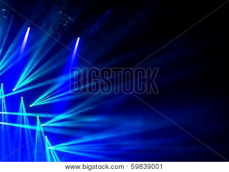 Blue stage light, abstract background, illuminated dance club, night performance, laser illumination, luxury rock concert projector