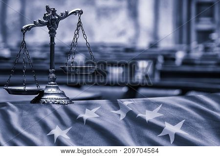 Symbol of law and justice in the empty courtroom law and justice concept.