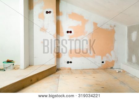 Working Process Of Installing Plasterboard Or Drywall For Making Gypsum Walls In Apartment Is Under 