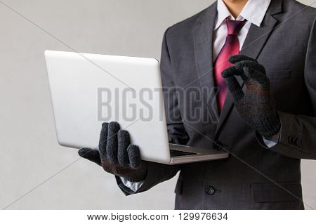 Business Man Wearing Gloves And Using Computer - Fraud, Hacker, Theft, Cyber Crime Concept