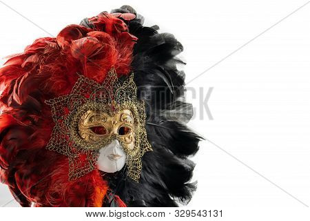 Italian Carnival. Venetian Red Black And Gold Mask. Mysterious Event, Party. White Back Ground, Copy