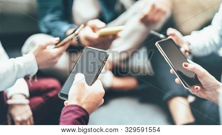 Friends Group Having Addicted Fun Using Mobile Smart Phone - Close Up Of People Hands Sharing Conten