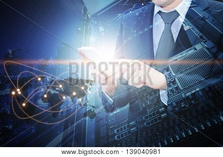 Double Exposure Of Professional Businessman Using Smart Phone With Servers Technology In Data Center