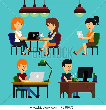 People sitting on chair at table in front of computer monitor