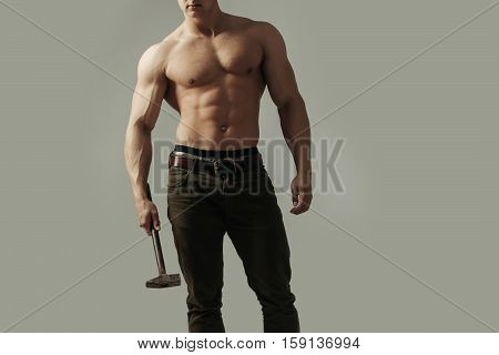 Sexy Muscular Man With Hammer