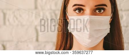 Banner Confident Female Doctor Surgeon In Protective Mask On Face In Hospital. Young Sick Woman In M